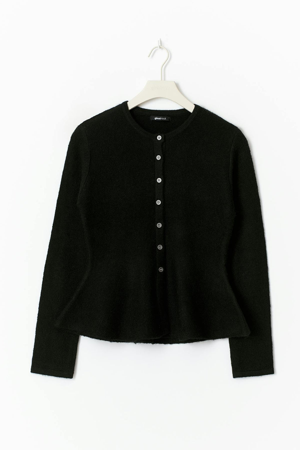 Knitted peplum cardigan
