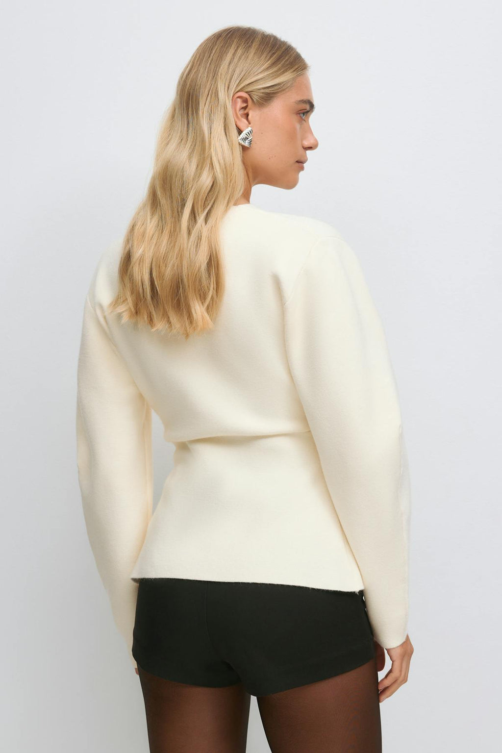 Shaped knitted cardigan