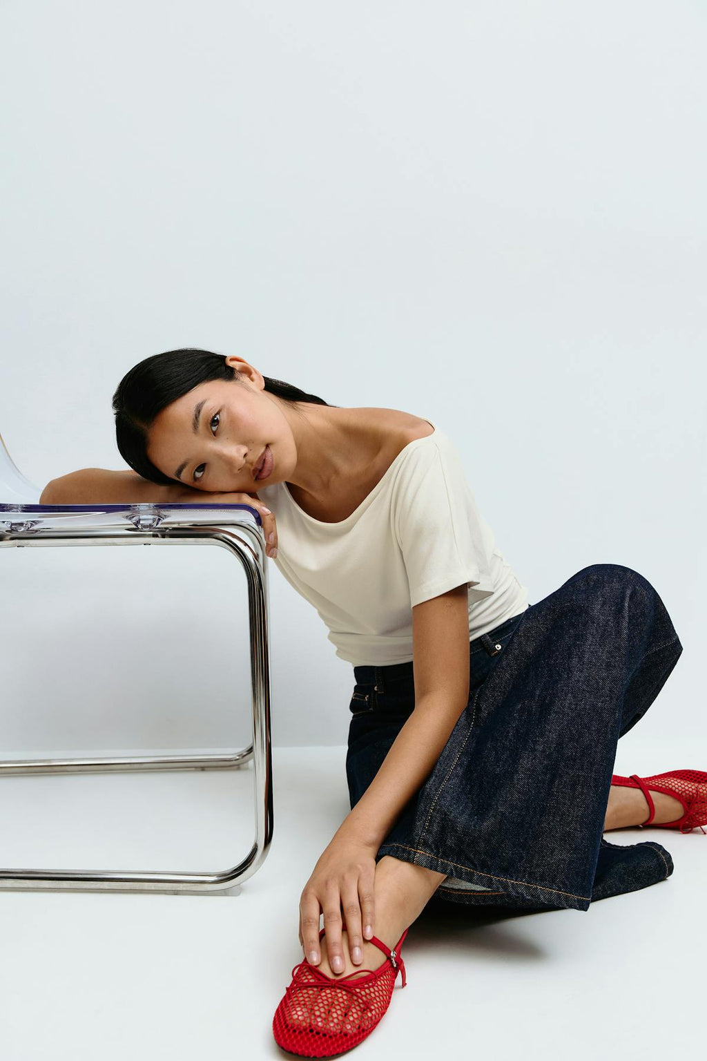 Sloped shoulder top