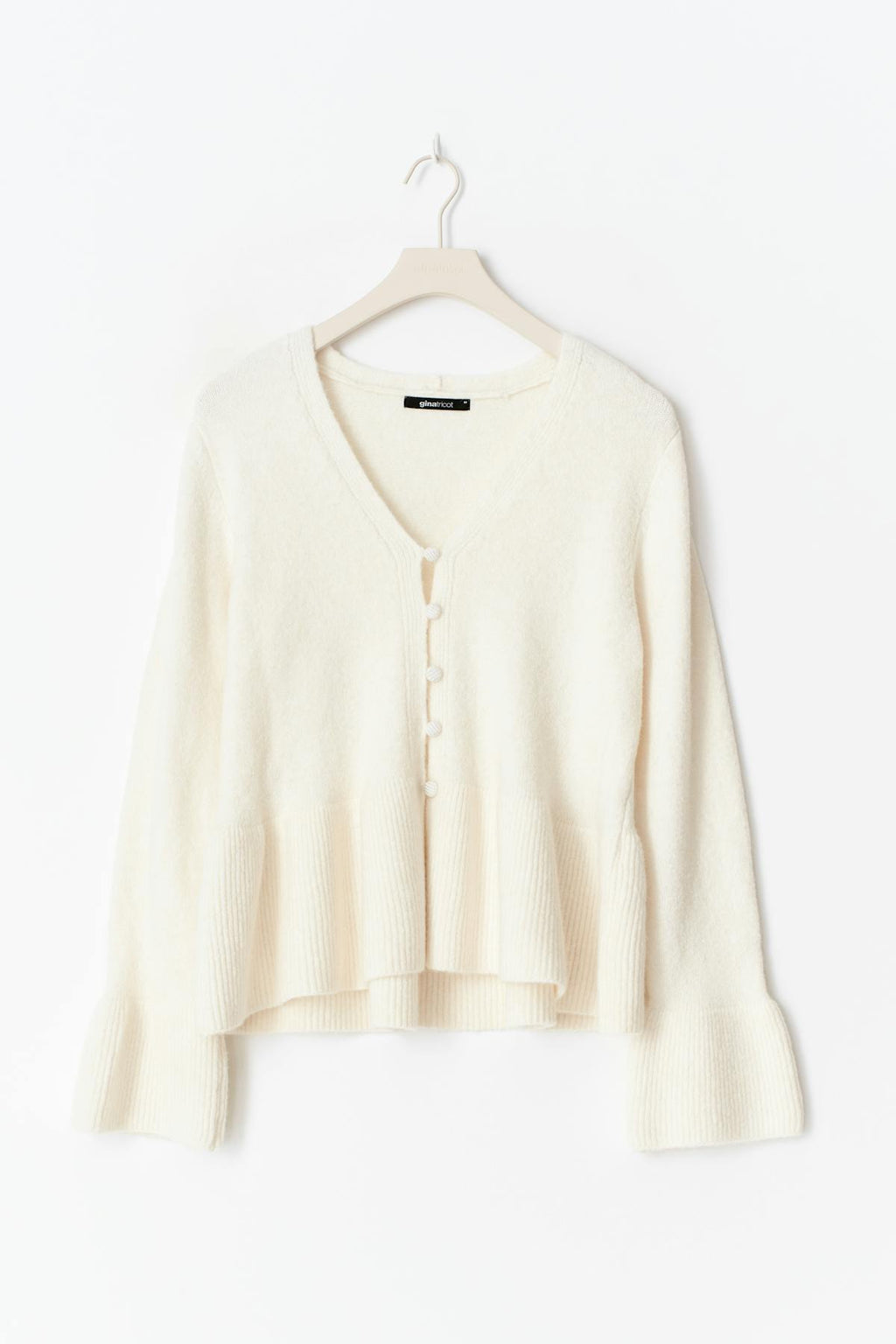 Knitted peplum cardigan