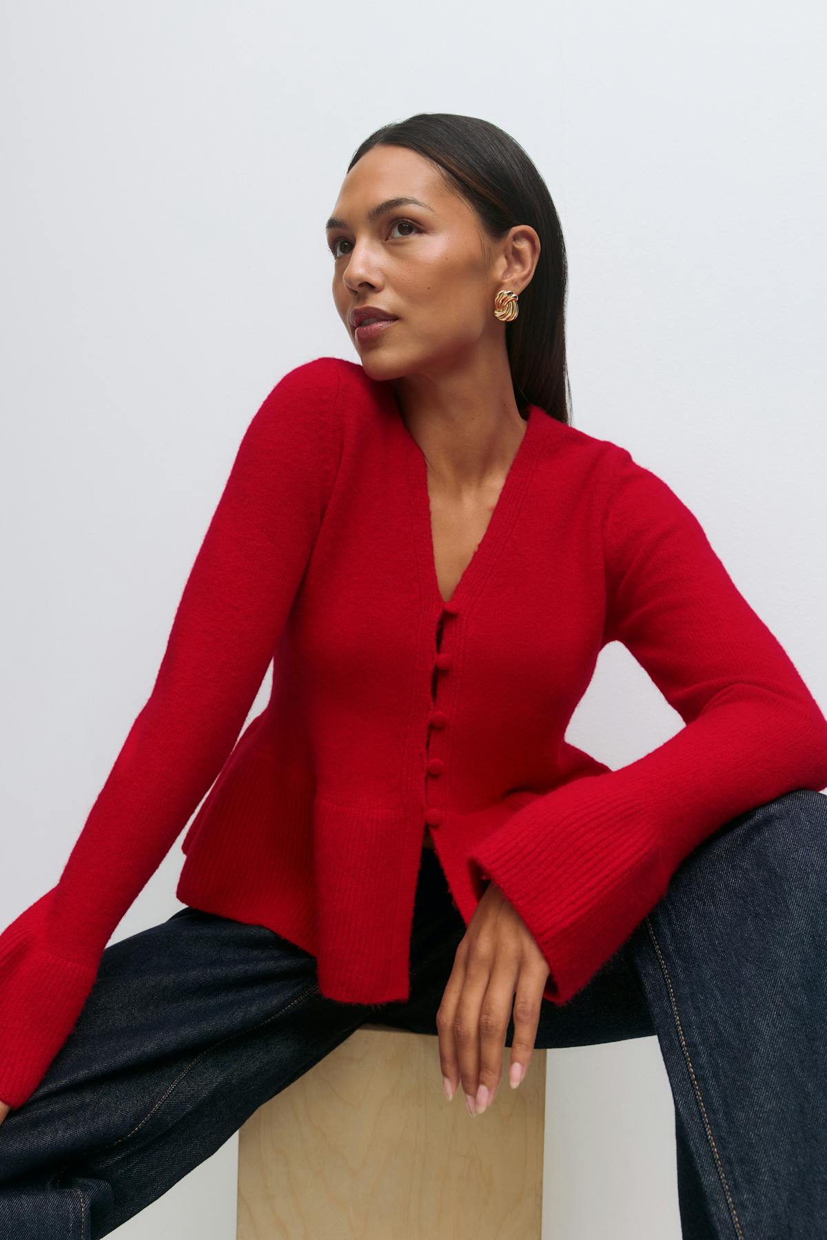 Knitted peplum cardigan