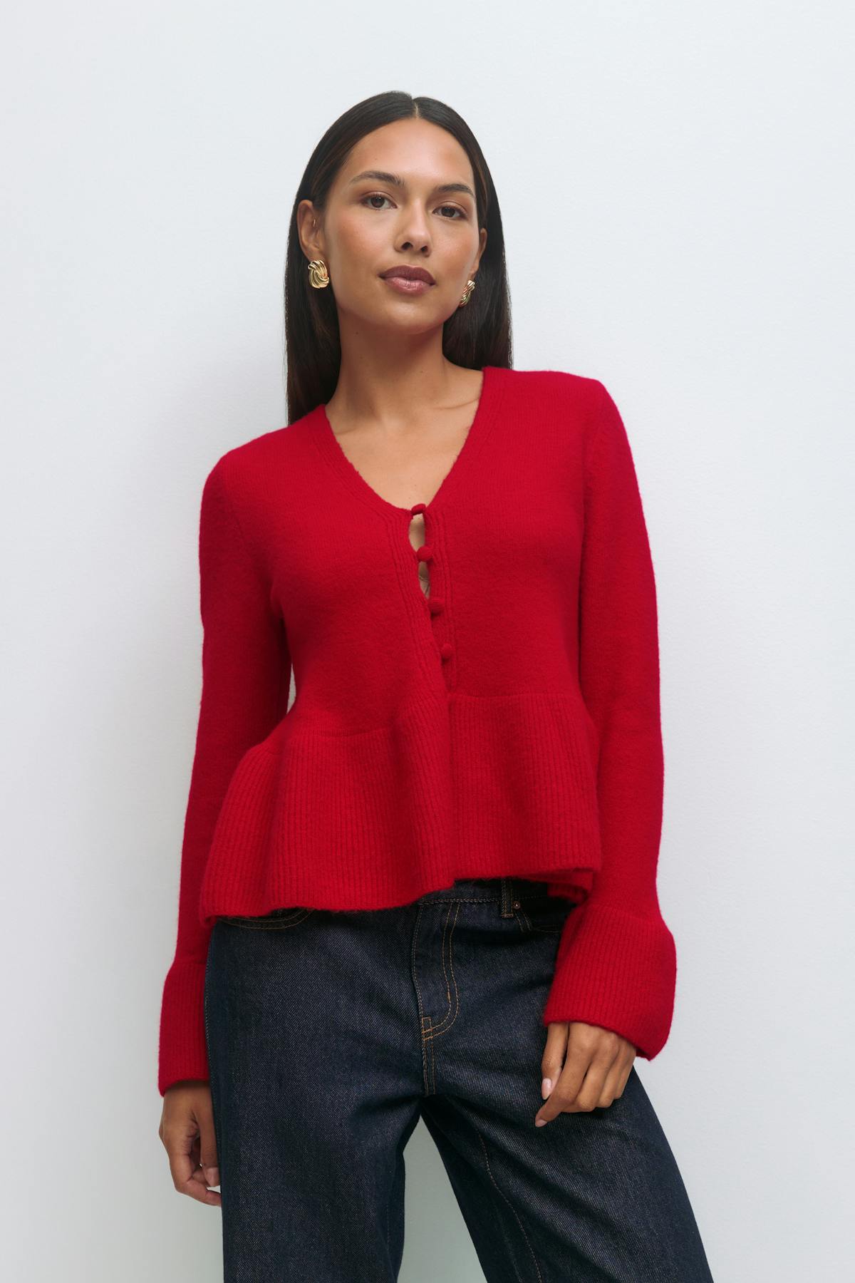 Knitted peplum cardigan
