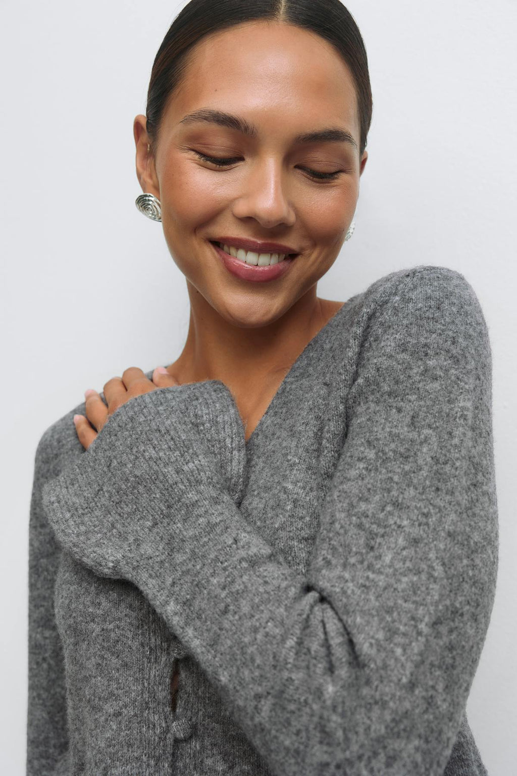 Knitted peplum cardigan