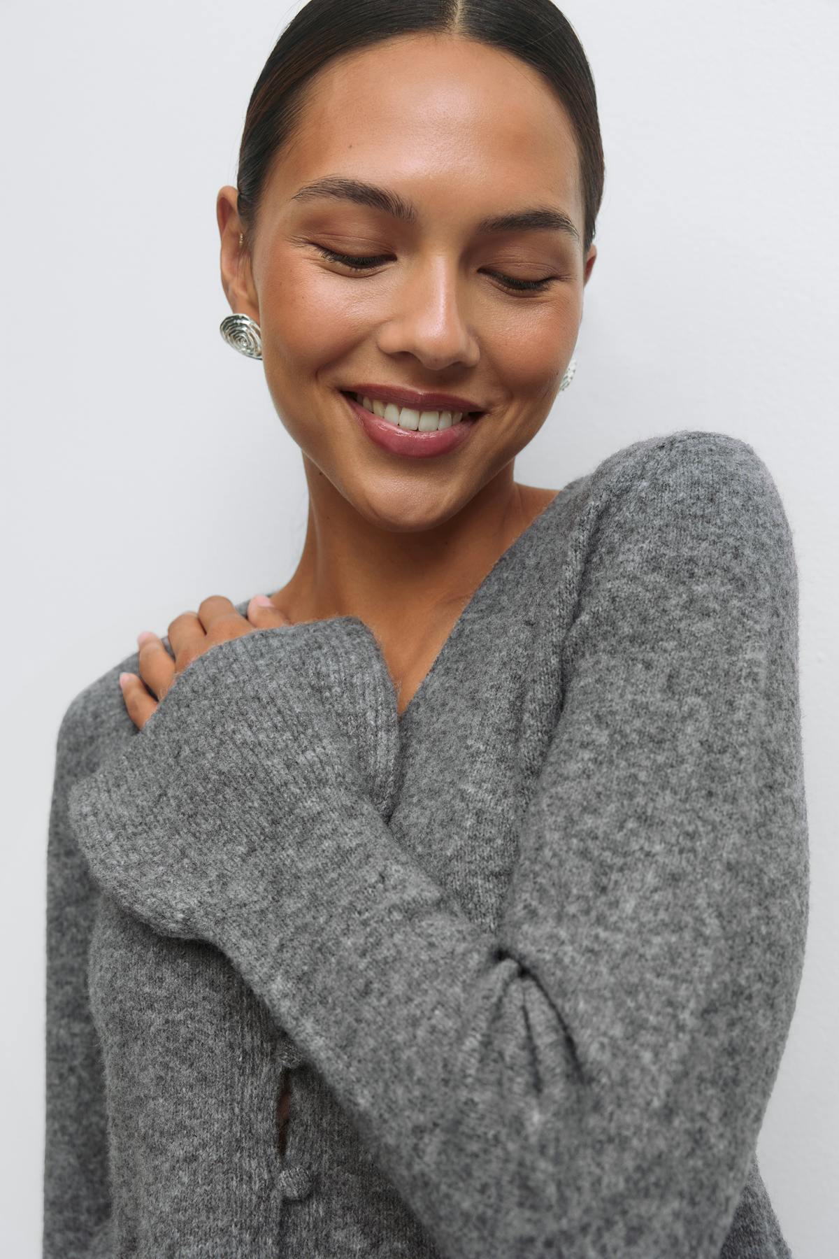 Knitted peplum cardigan