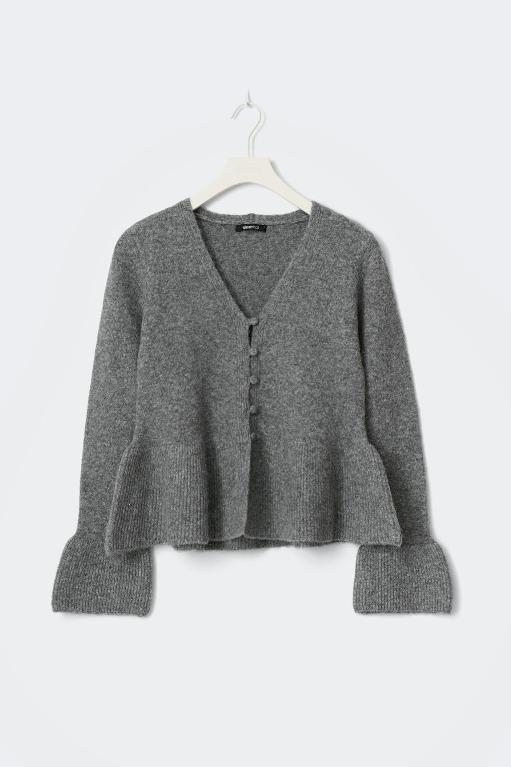 Knitted peplum cardigan
