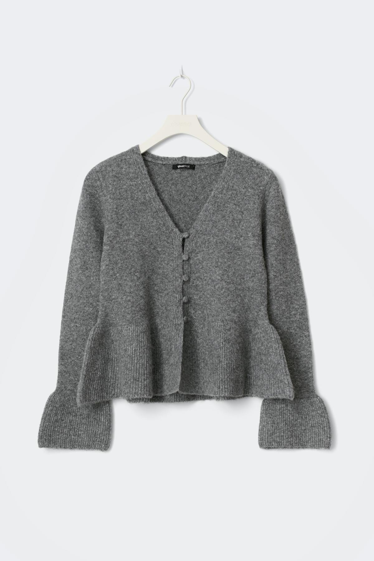 Knitted peplum cardigan