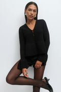 Knitted peplum cardigan