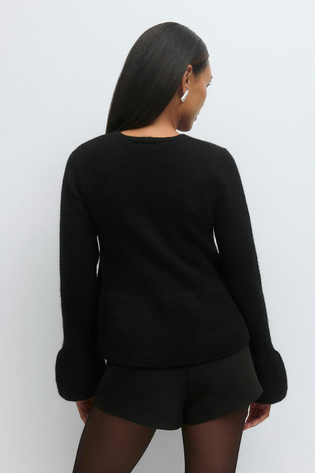 Knitted peplum cardigan