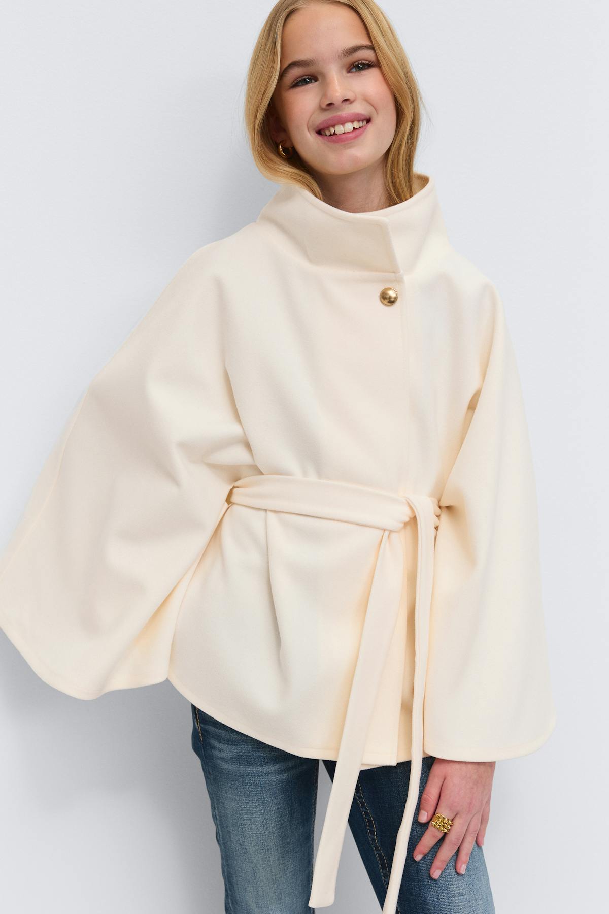 Y belted cape