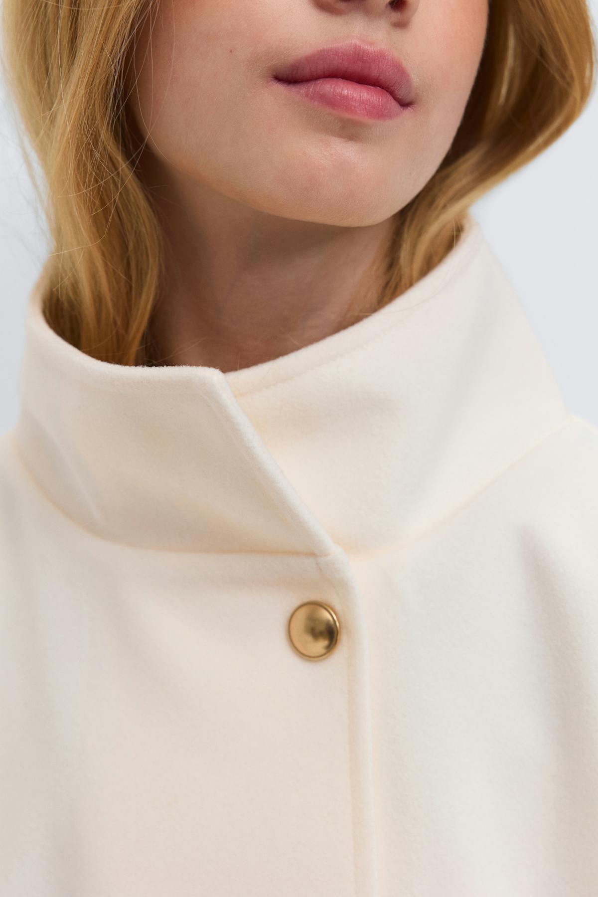 Y belted cape