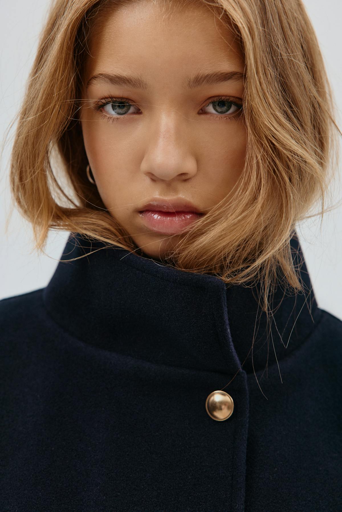 Y belted cape