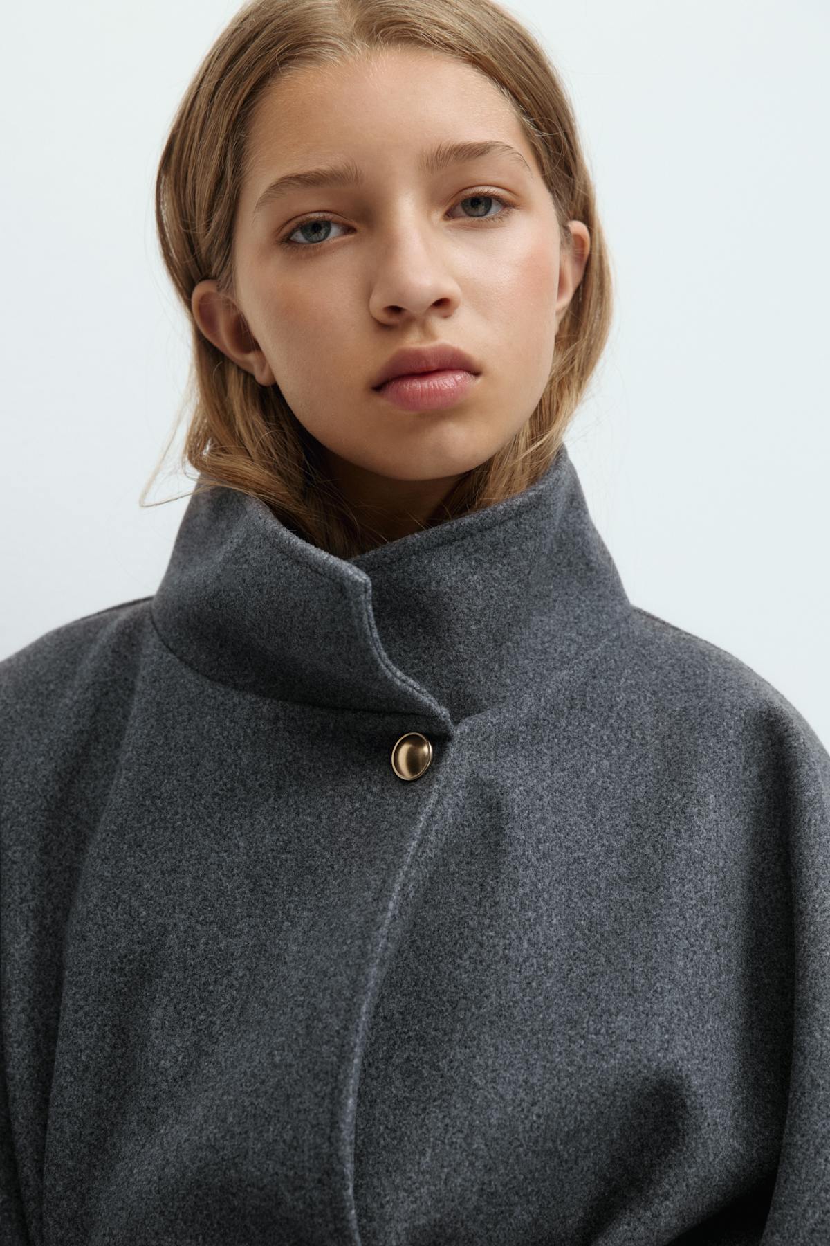 Y belted cape