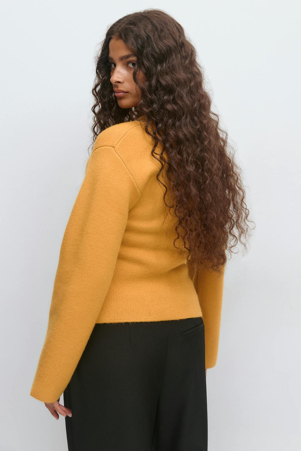 Shaped knitted cardigan
