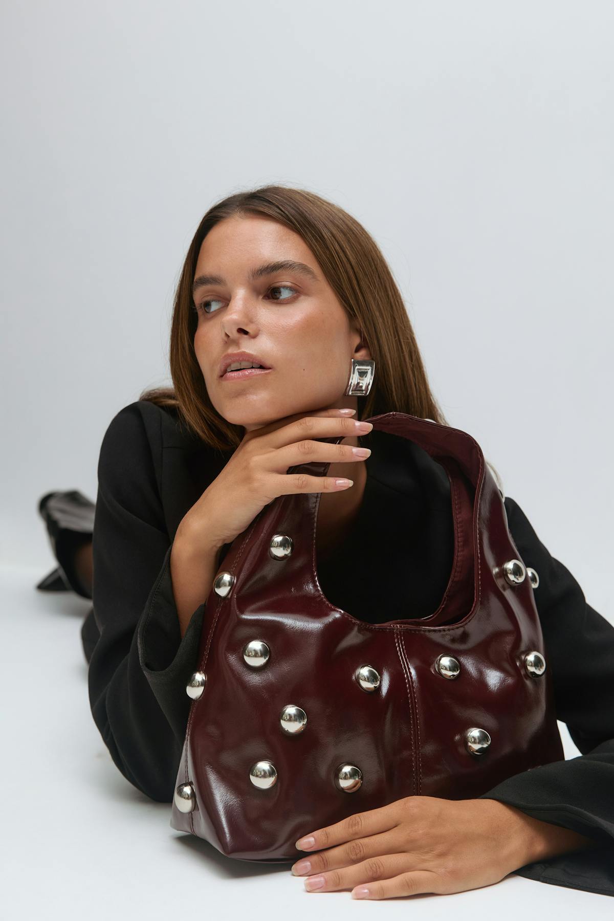 Slouchy studded bag