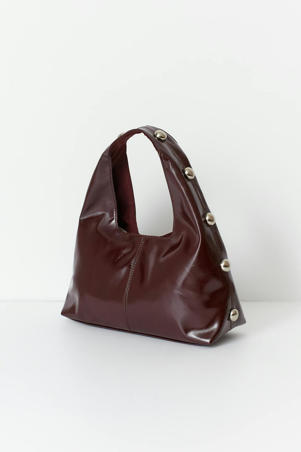 Slouchy studded bag