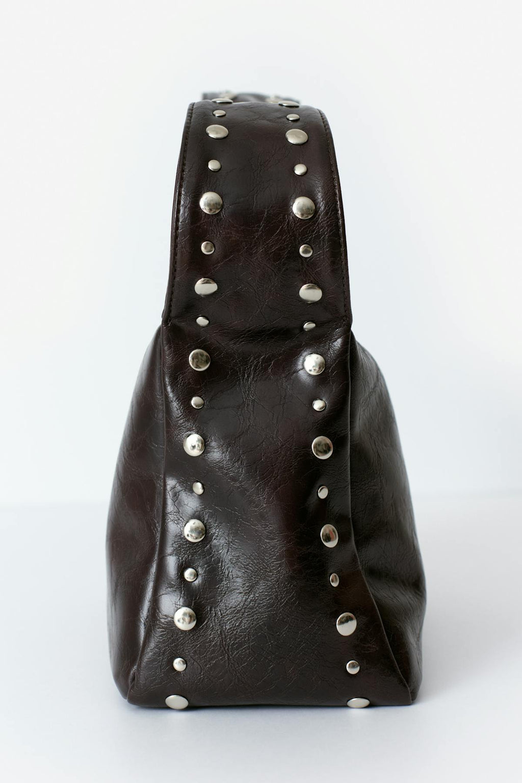 Small slouchy studded bag