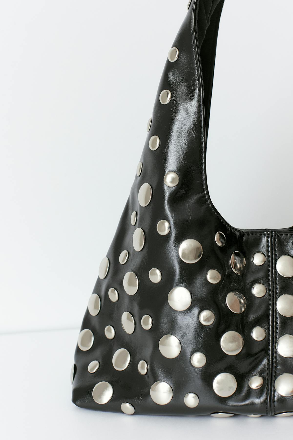 Slouchy small studded bag