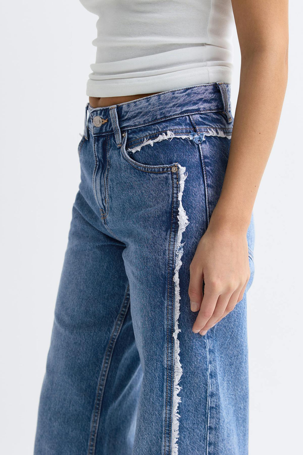Fringe seam jeans