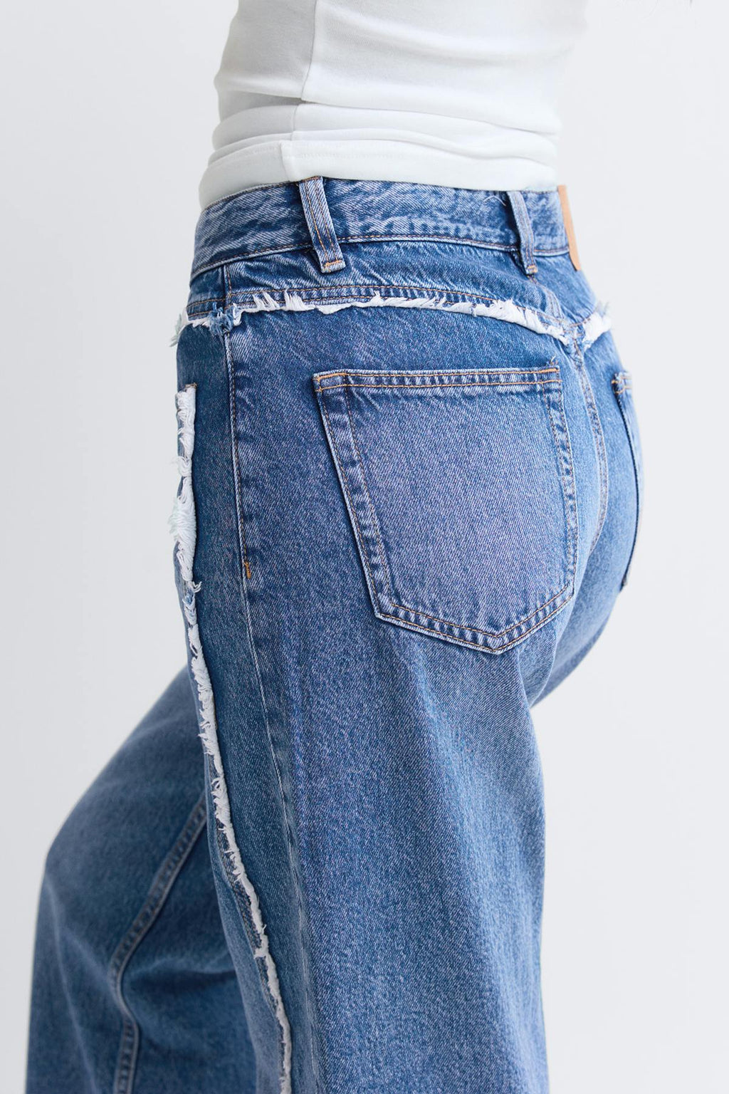 Fringe seam jeans
