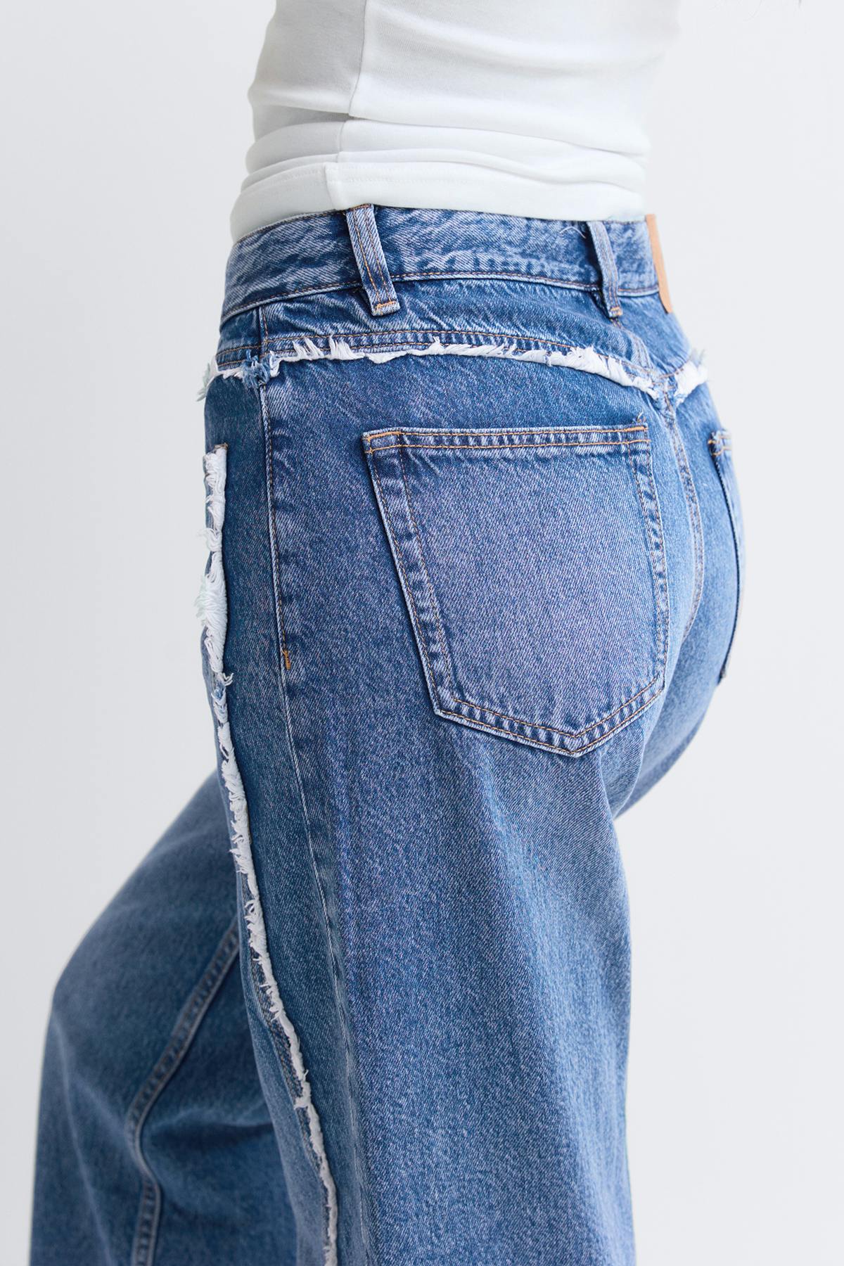 Fringe seam jeans