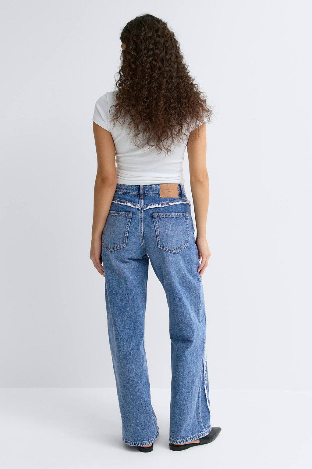 Fringe seam jeans