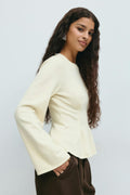 Knitted peplum top