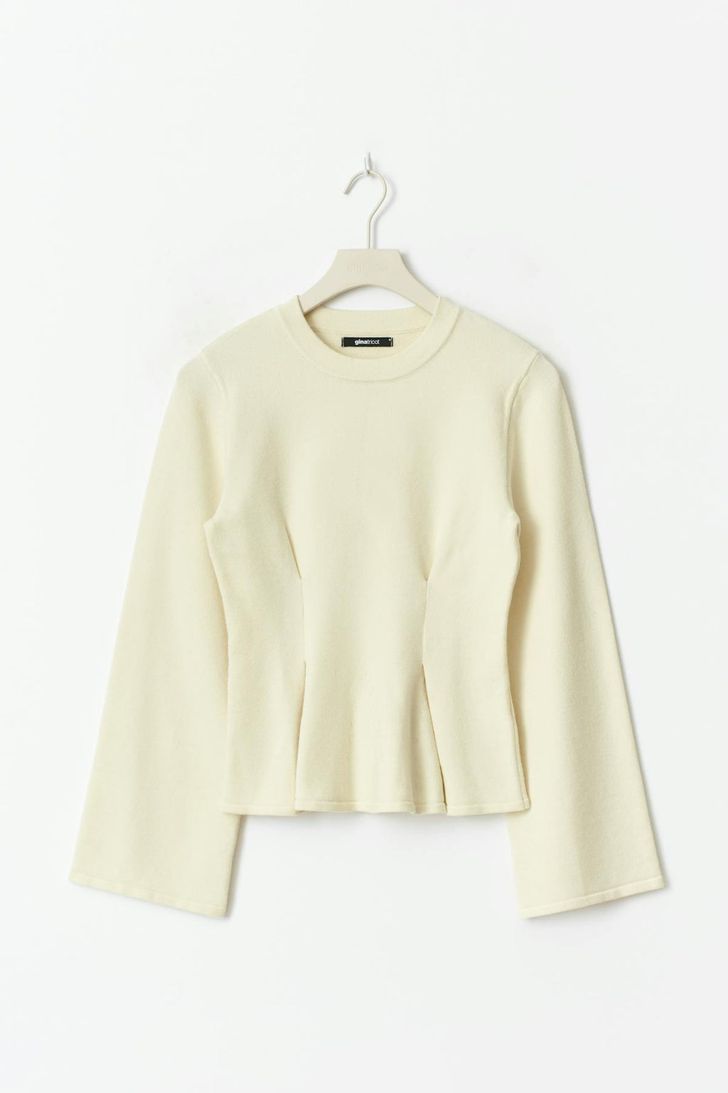 Knitted peplum top