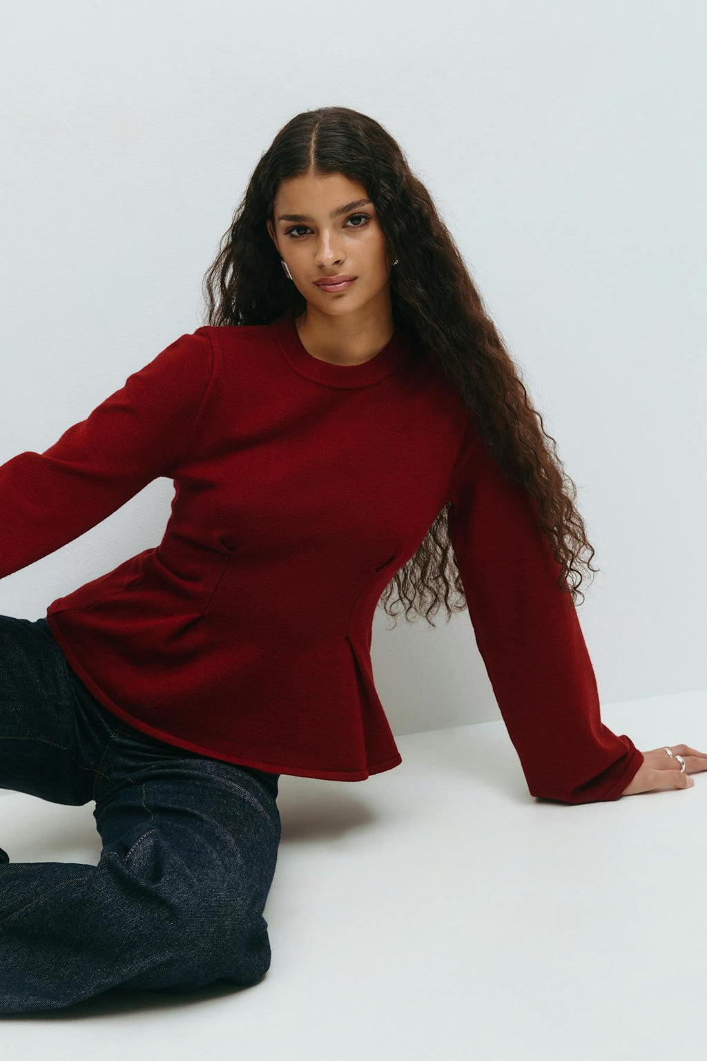 Knitted peplum top