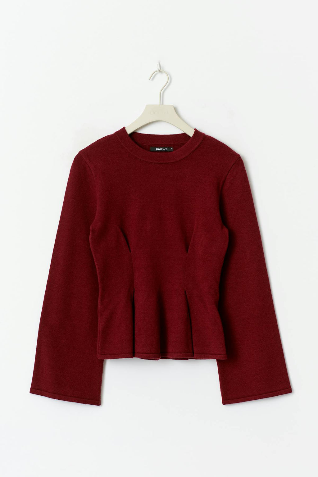Knitted peplum top
