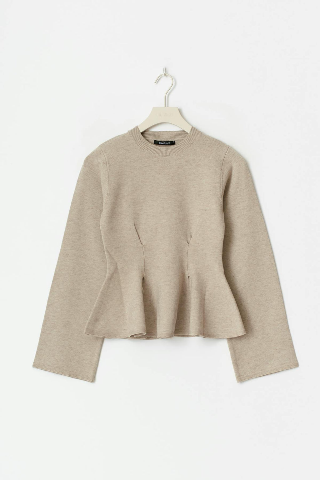 Knitted peplum top