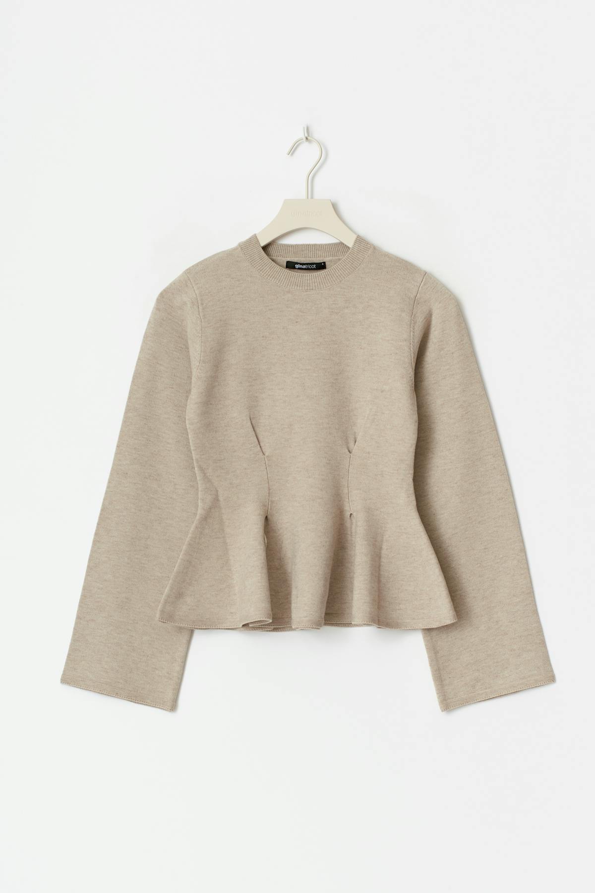 Knitted peplum top