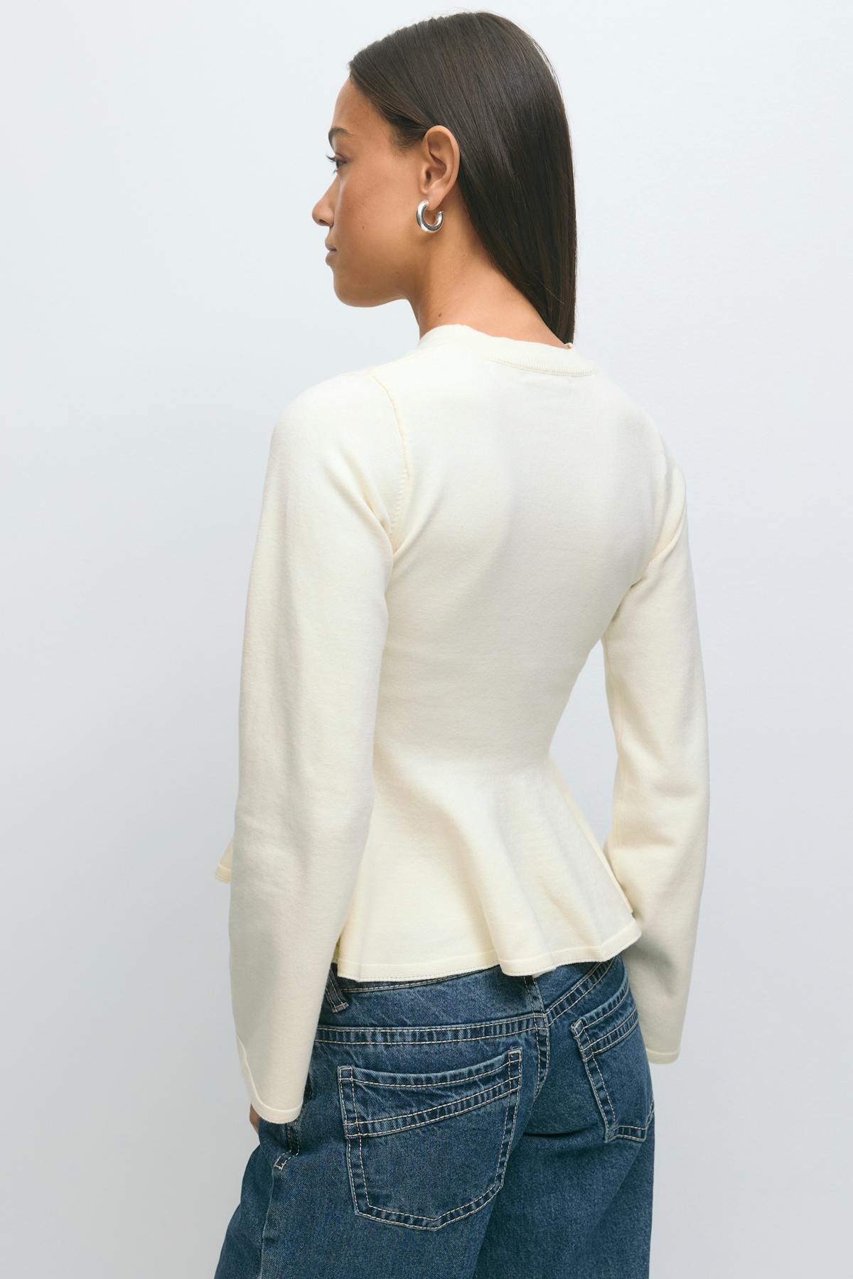Knitted peplum top