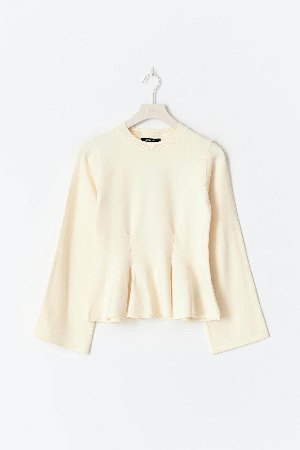 Knitted peplum top