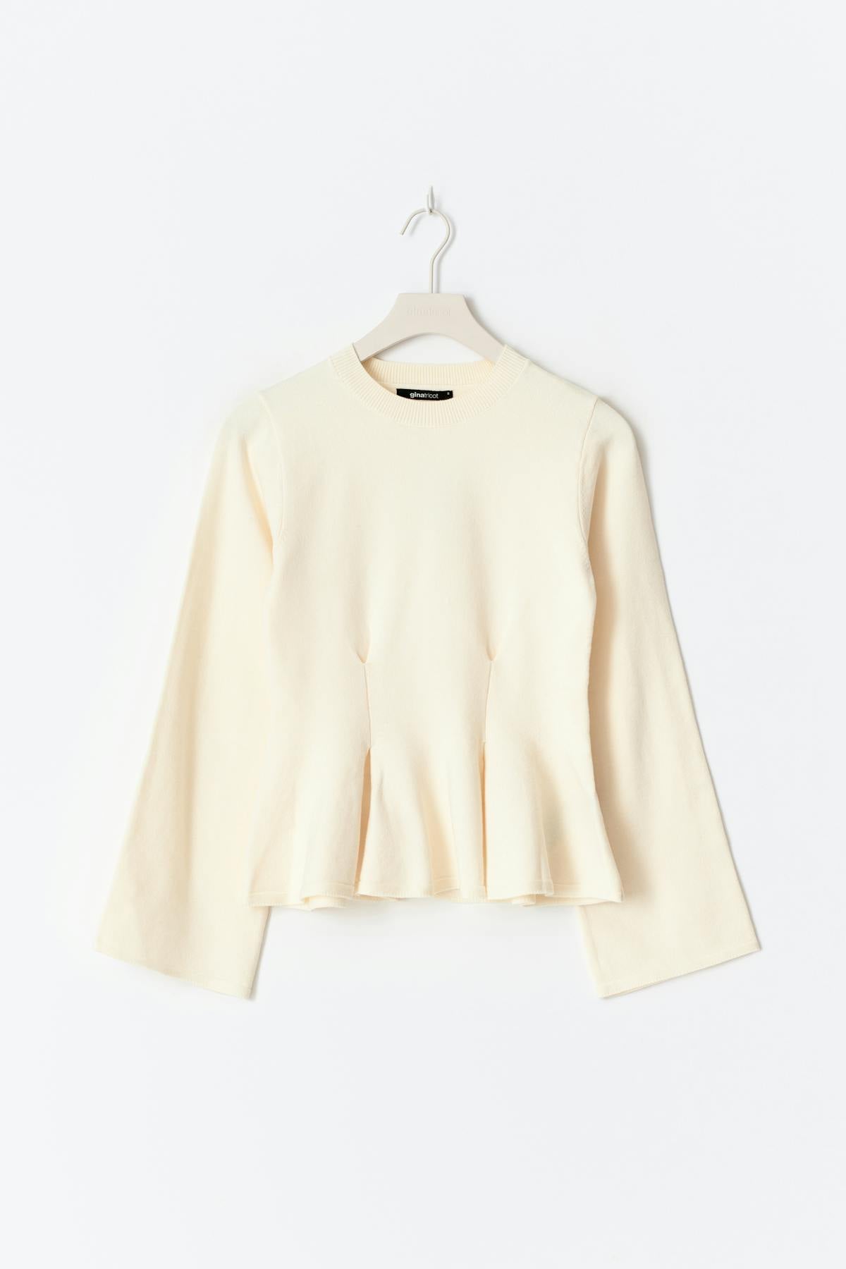 Knitted peplum top