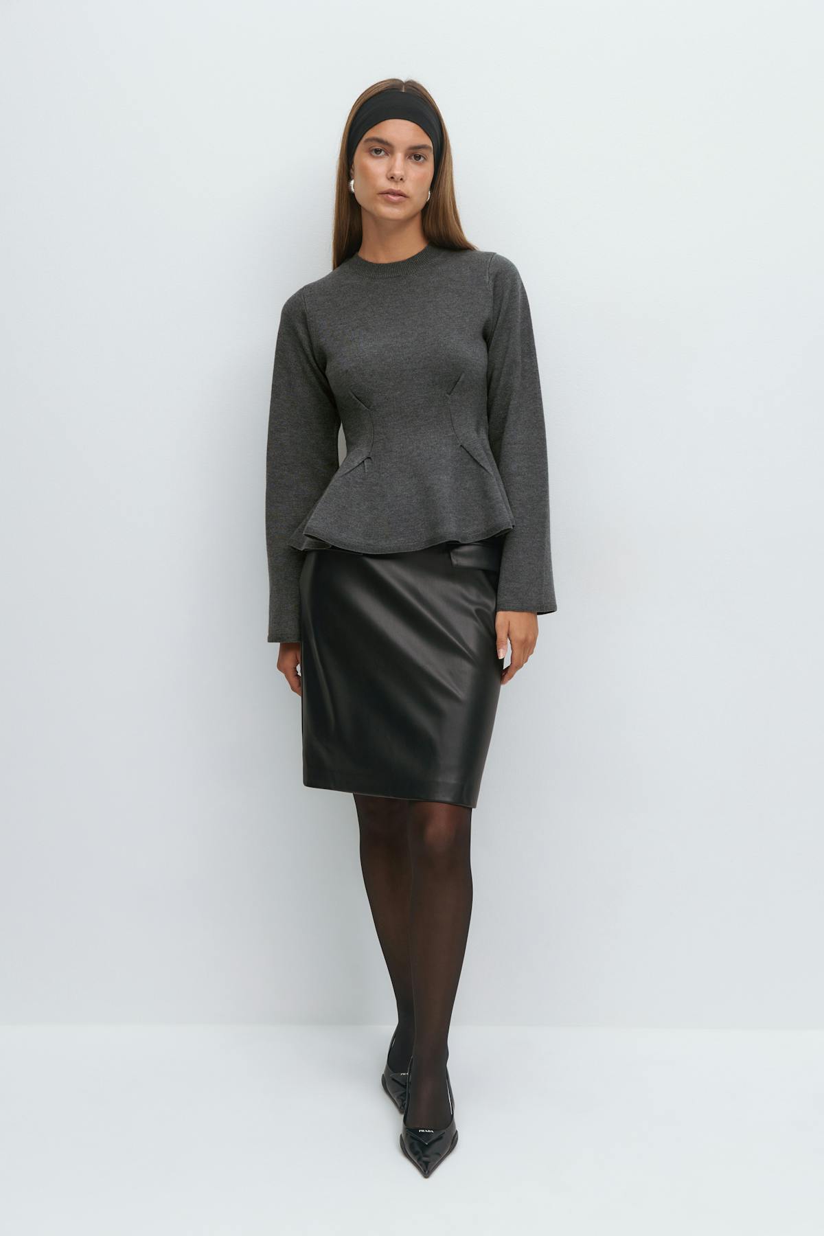 Knitted peplum top