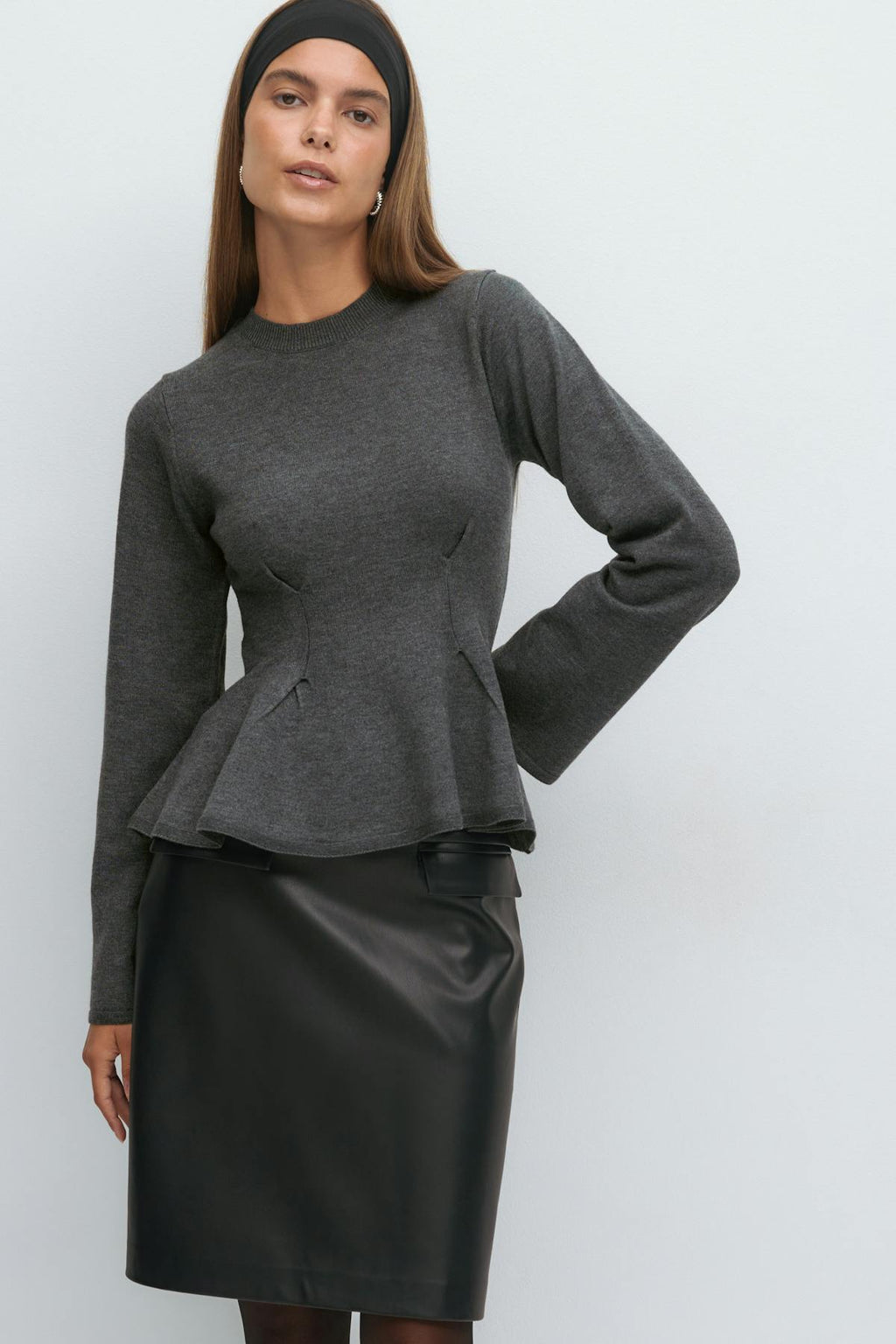 Knitted peplum top