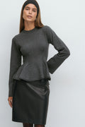 Knitted peplum top