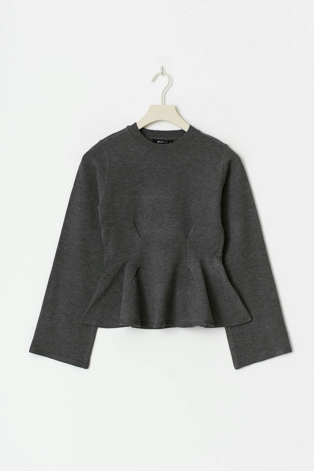 Knitted peplum top