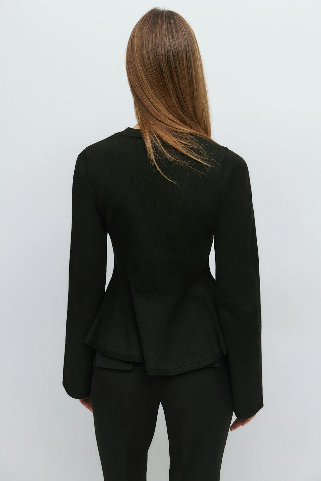 Knitted peplum top