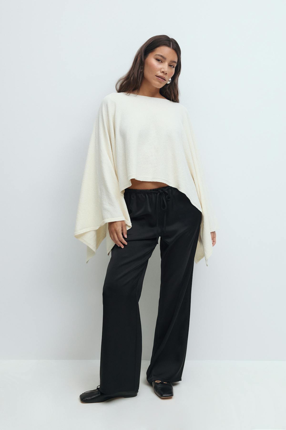 Knitted cape top