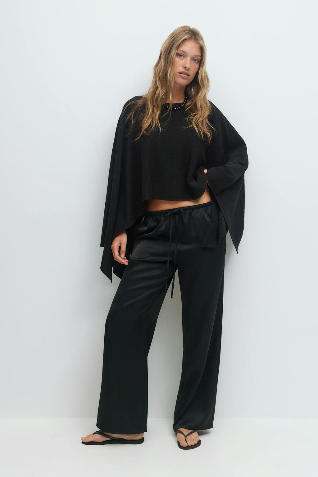 Knitted cape top
