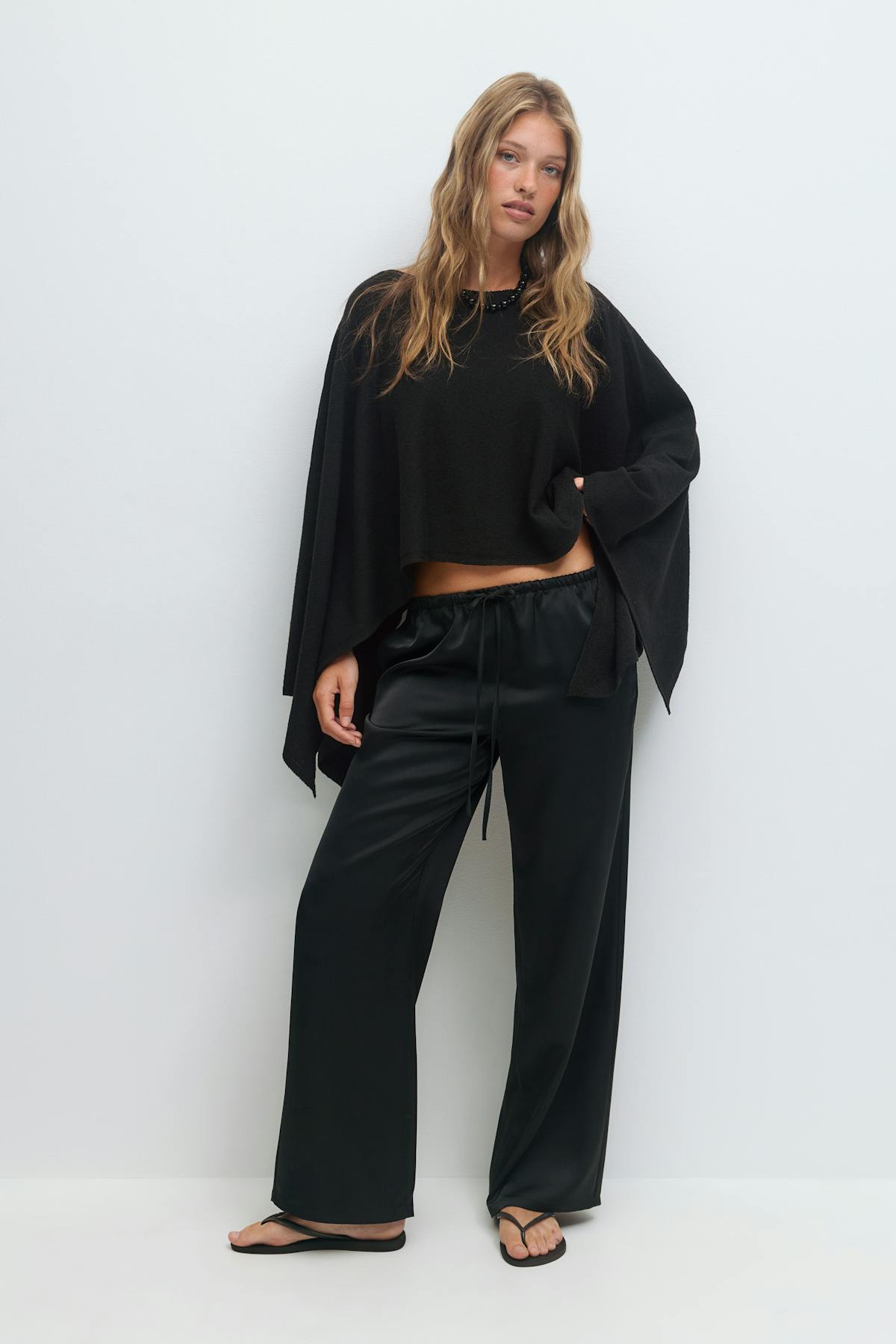 Knitted cape top