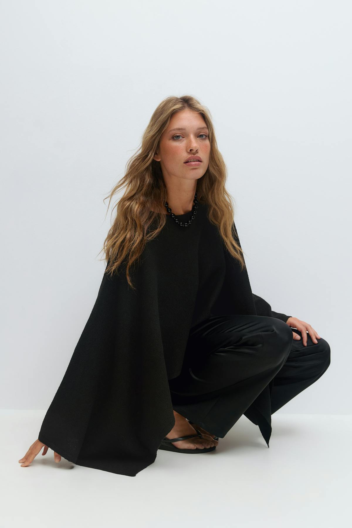 Knitted cape top