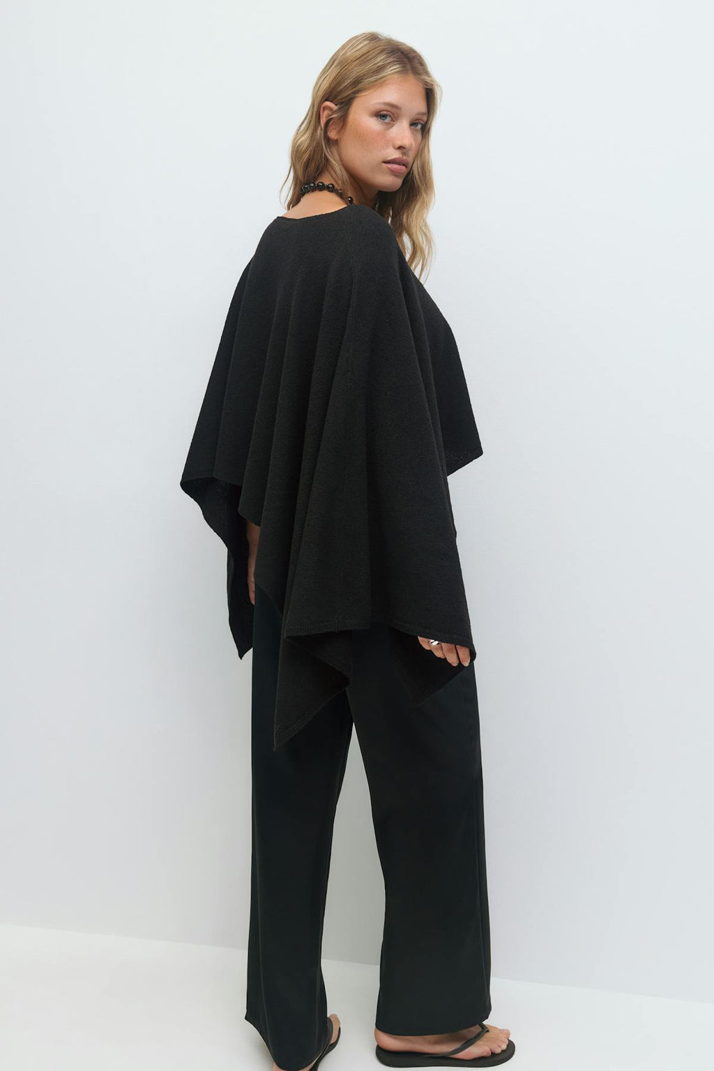 Knitted cape top