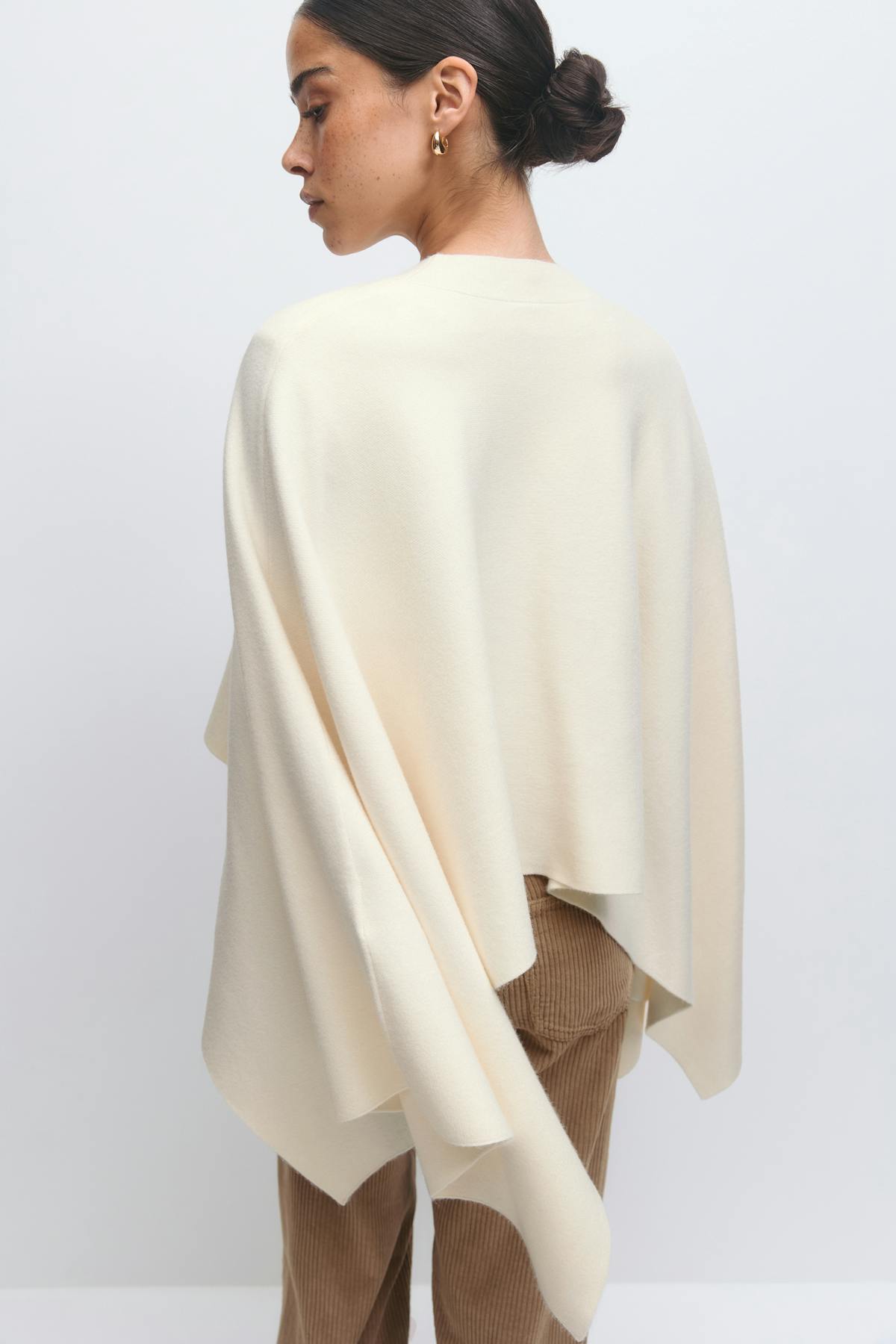 Knitted cape top