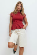Funnel neck peplum top