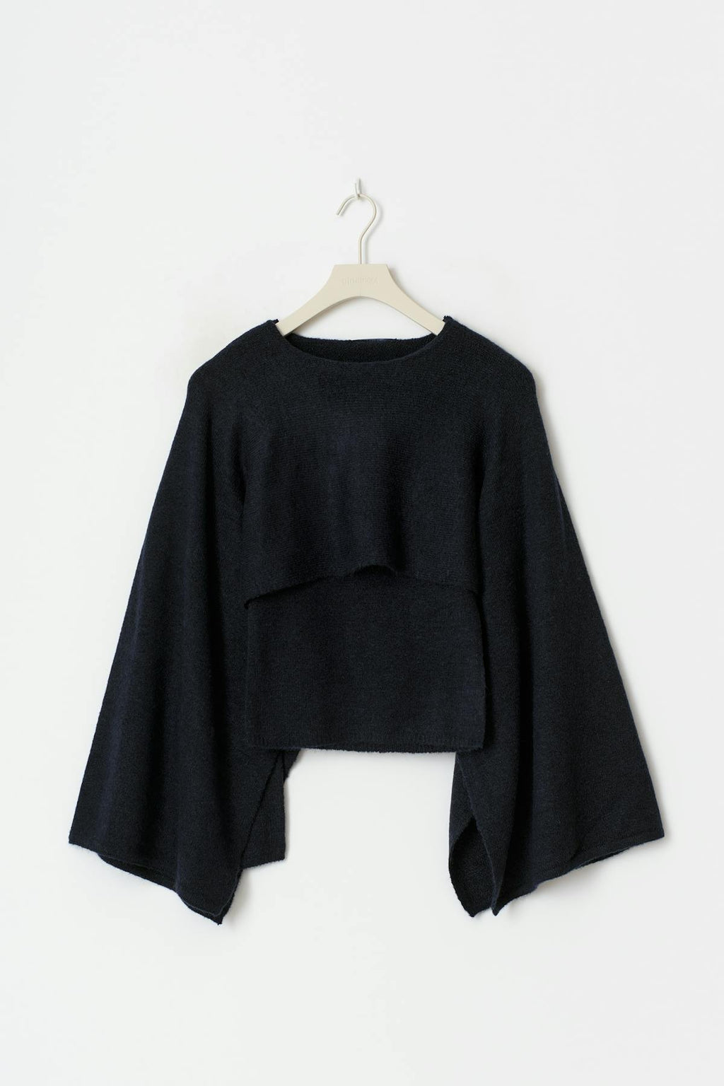 Knitted cape top
