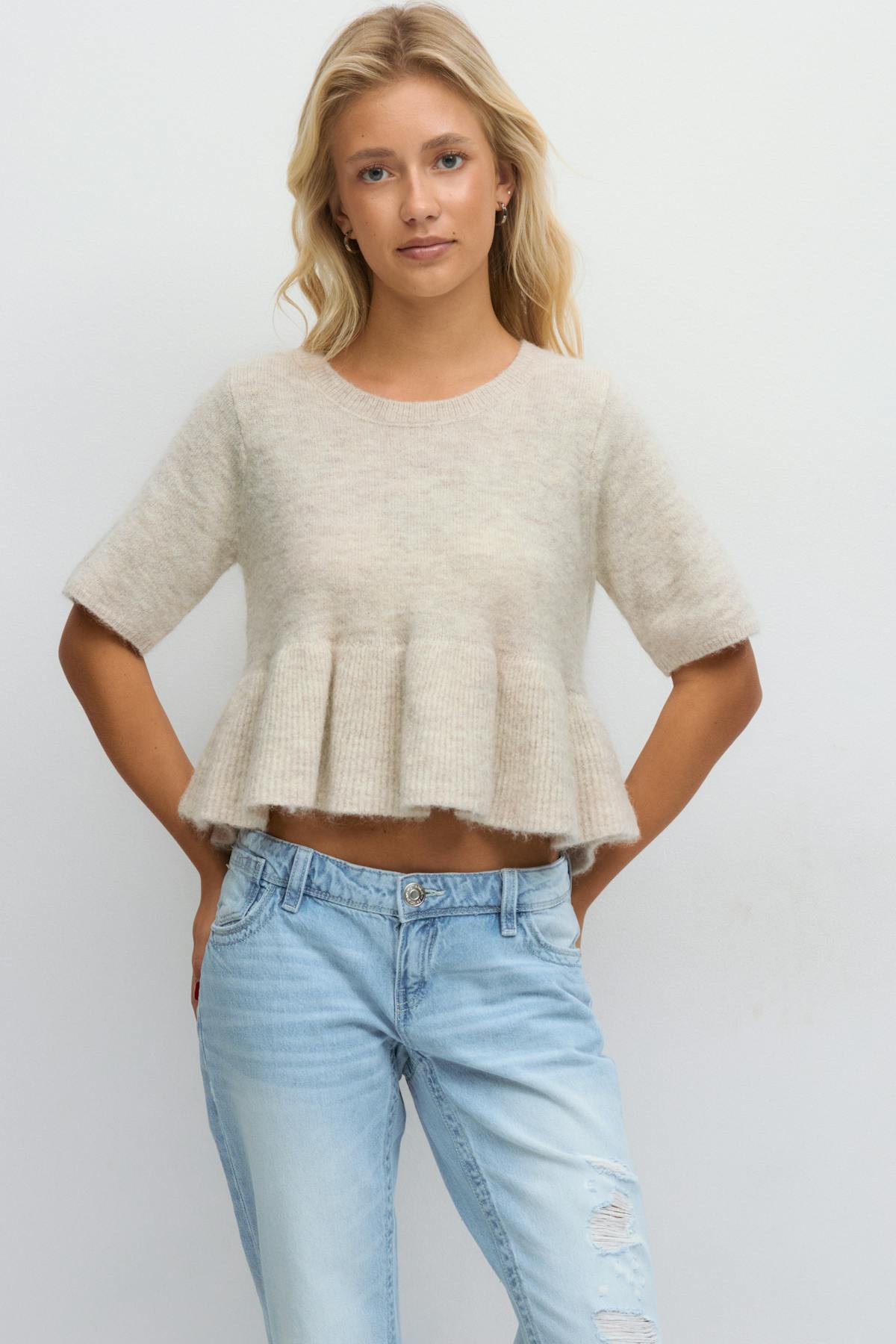 14+ knitted peplum top