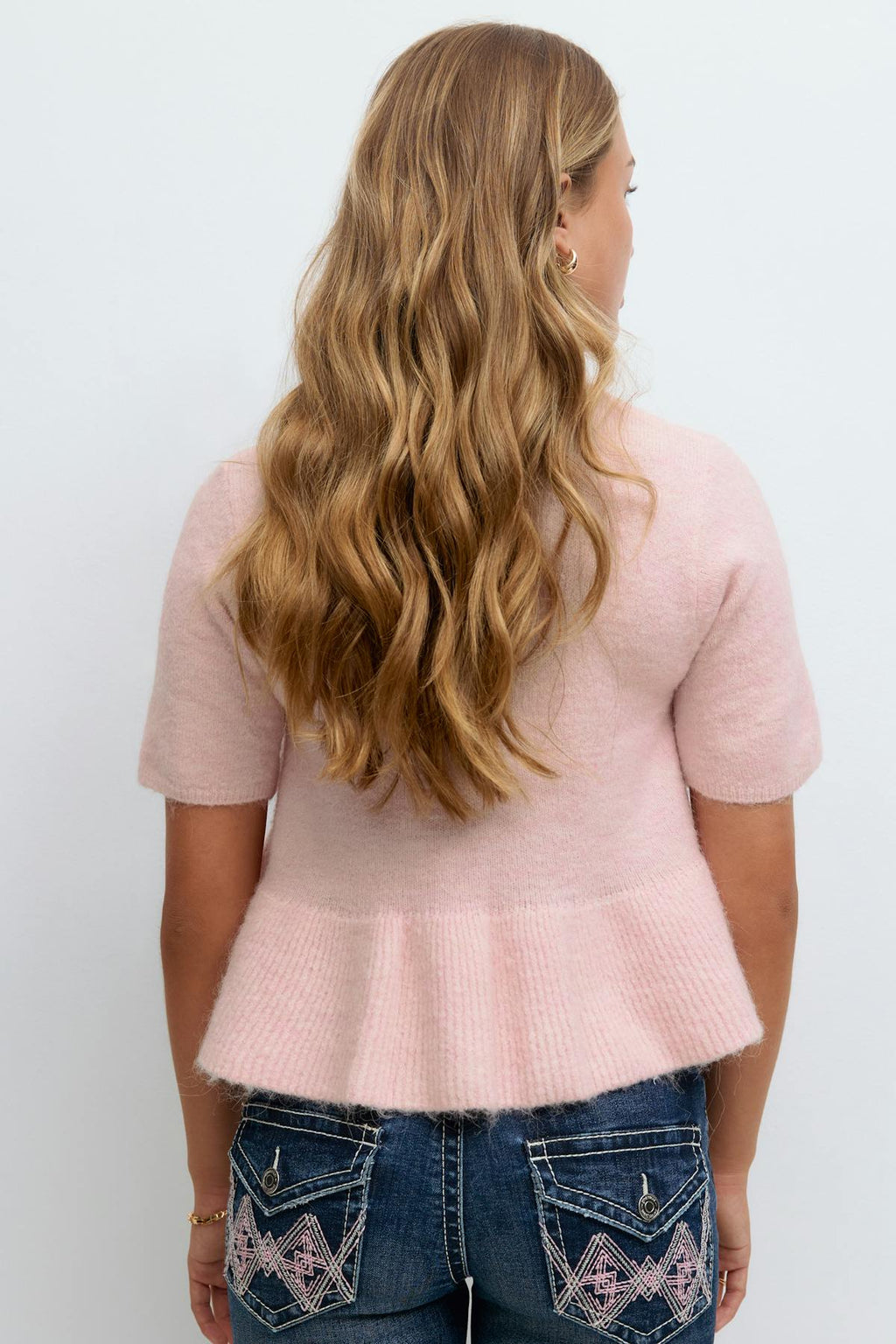 Y knitted peplum top