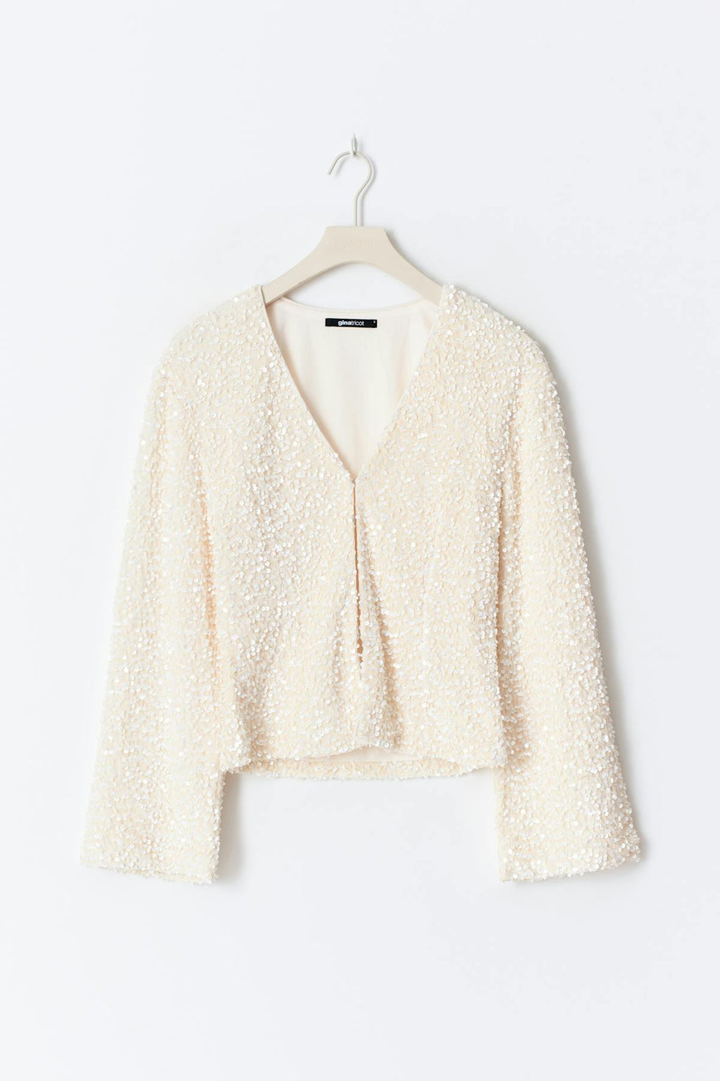 Shaped sequin top